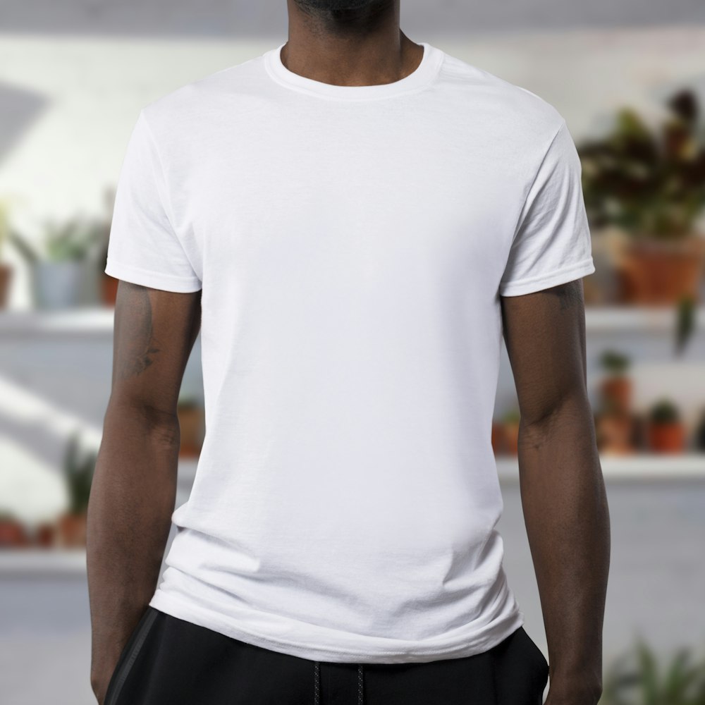 On-model shot: plain white tee, synthetic model disclosed